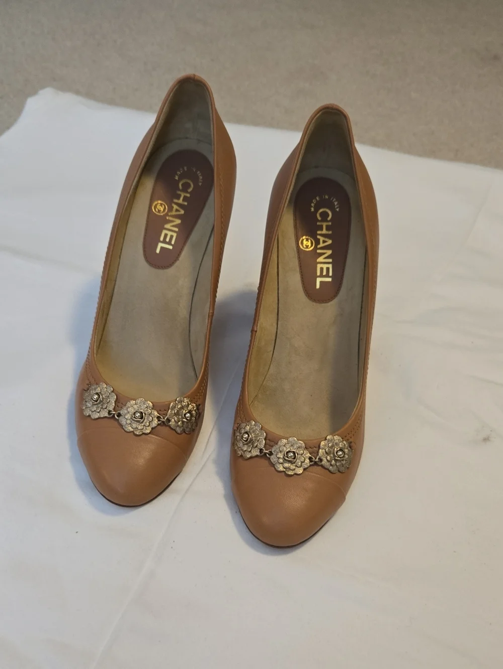 CHANEL Tan Leather Pumps with Gold Floral Accents